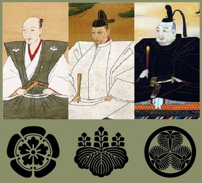 Japan_unificatori Oda Nobunaga, Toyotomi Hideyoshi e Tokugawa Ieyasu con gli stemmi dei rispettivi clan.
